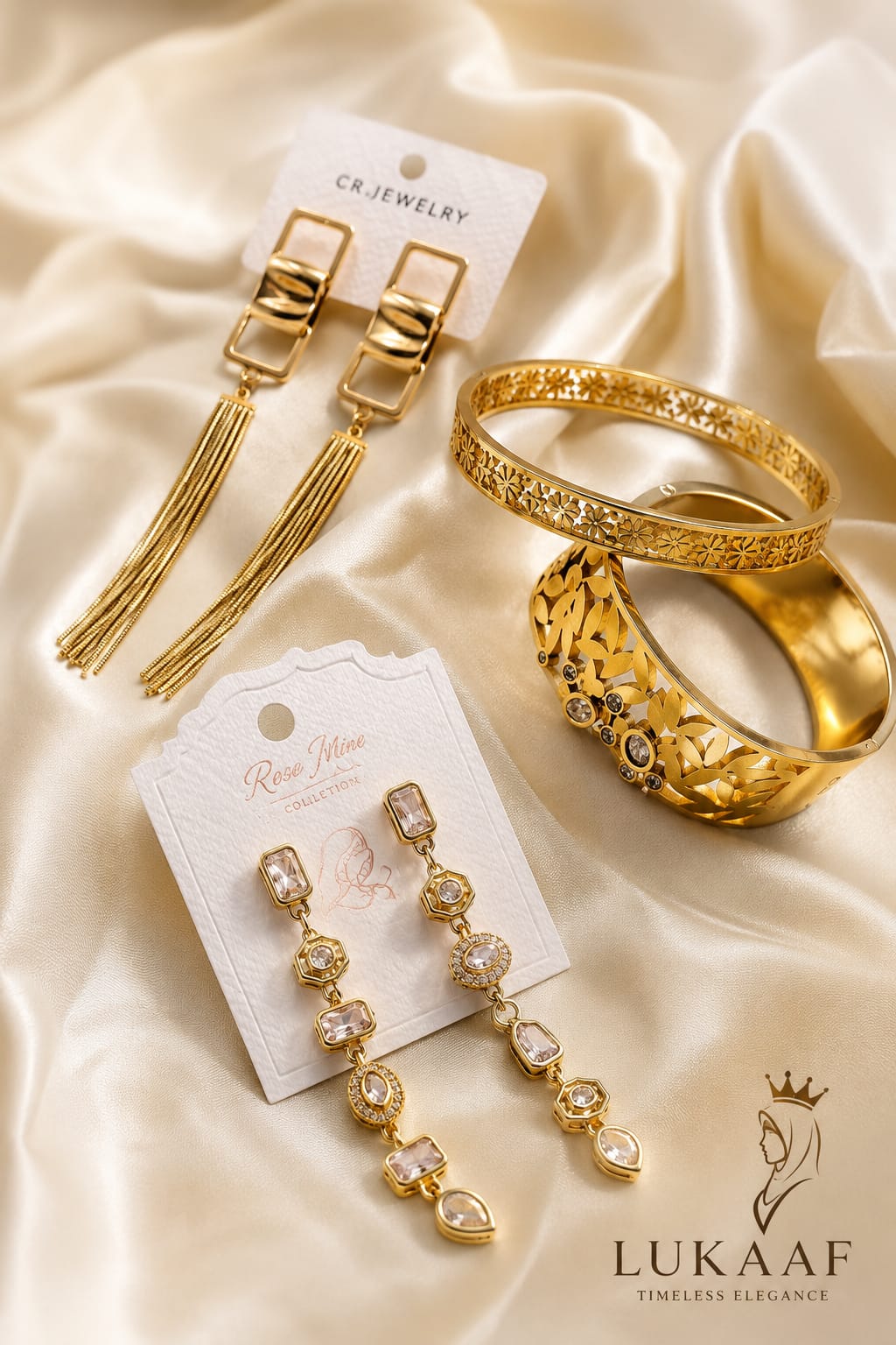 Elegant gold earrings beside alabaster